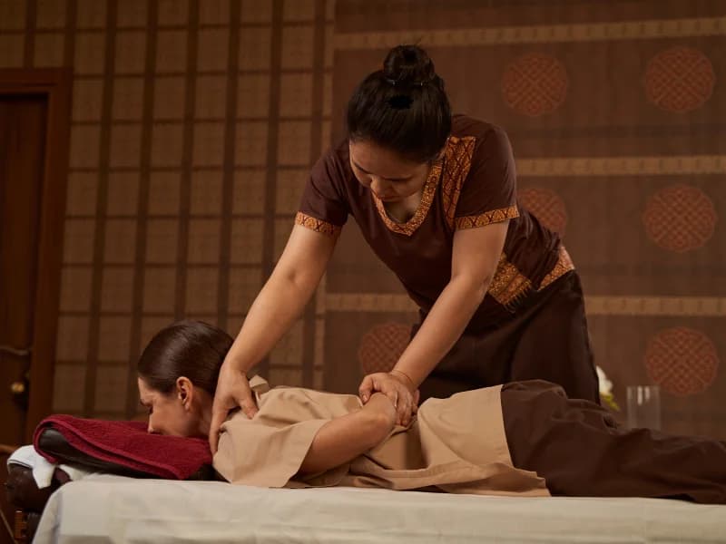 Therapist stretching a client's foot